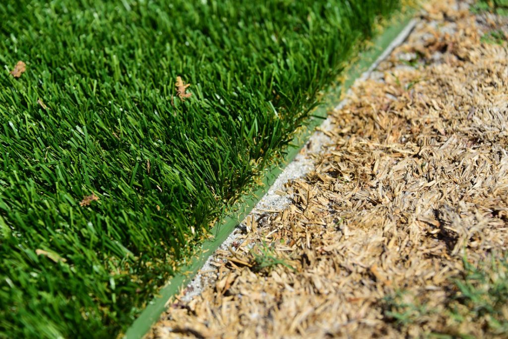 low profile artificial grass border and soil