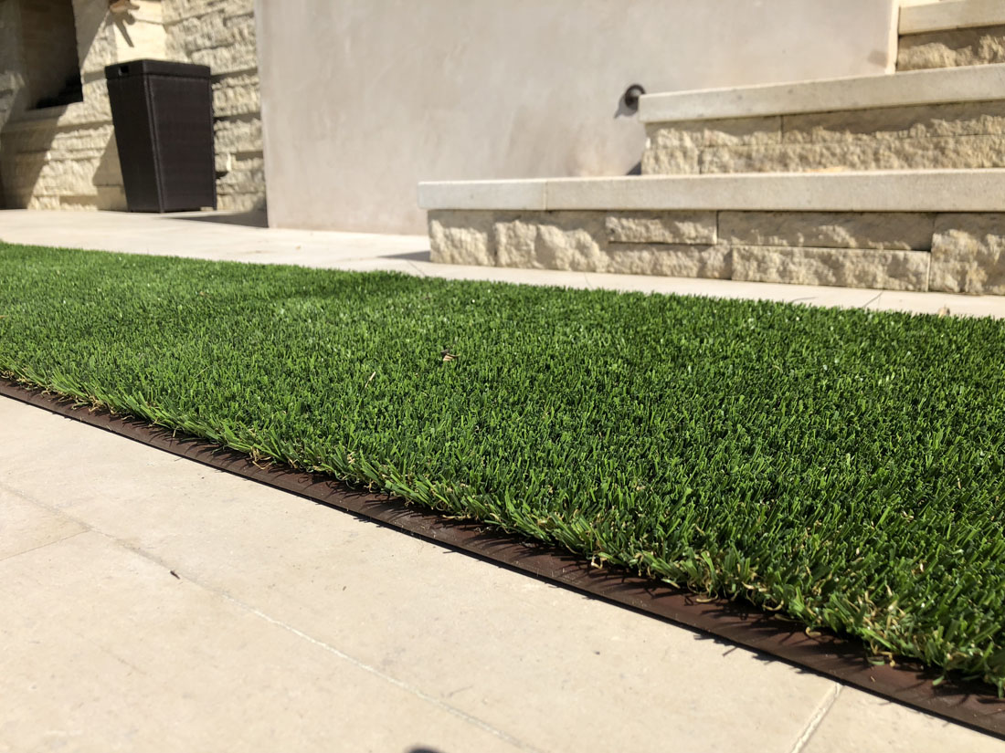 artificial lawn supplies green strip before tan steps