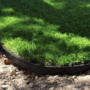 black artificial lawn border and artificial turf
