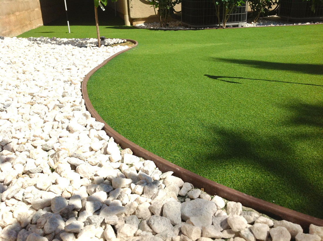 finished photo of DIY putting green featuring 2 holes