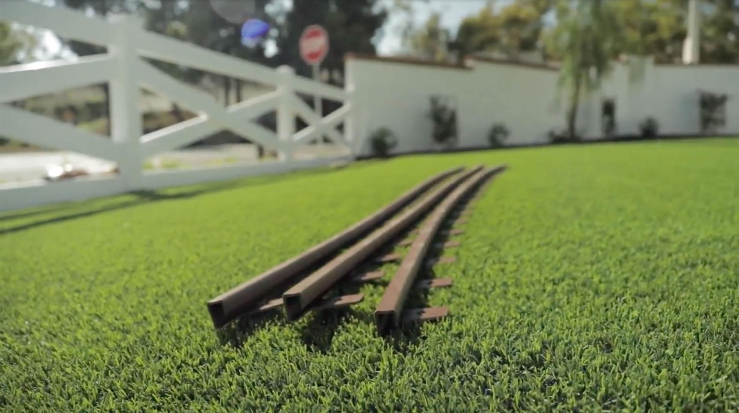 fake grass edging to be used for edging lawn sitting out of box